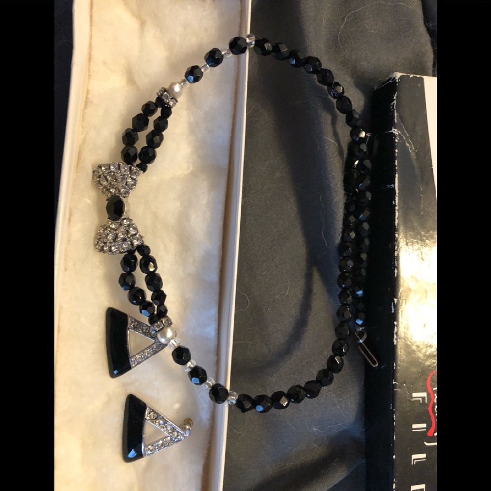 Rhinestone and black necklace and earrings
